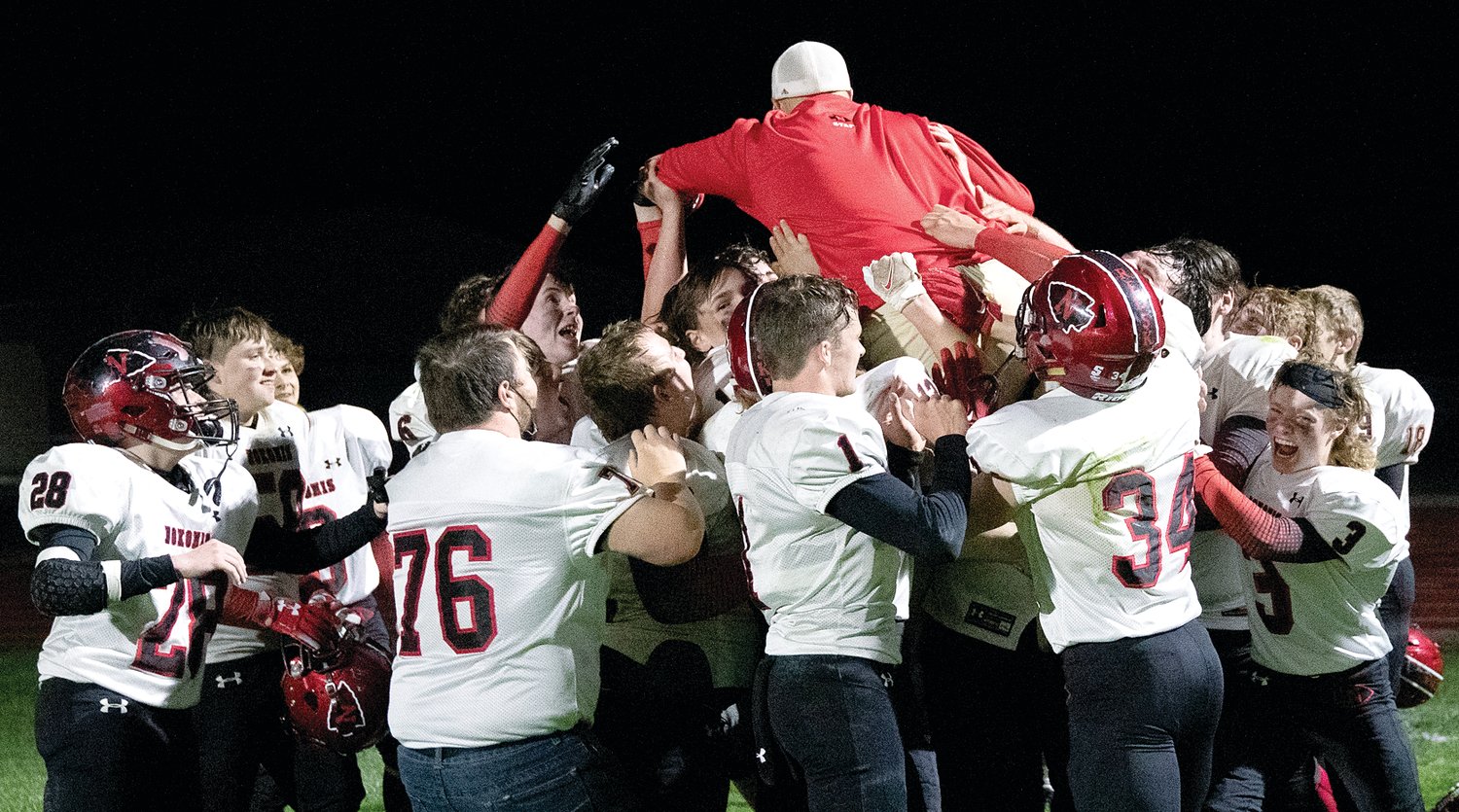 Nokomis football coach Ben Tarter showed that he still had some hops as the Redskins celebrated their 54-0 win over Red Bud on Friday, April 23. The victory secured a conference championship in the small school division of the Cahokia Conference for the Redskins as they finished the season with a perfect 6-0 record.