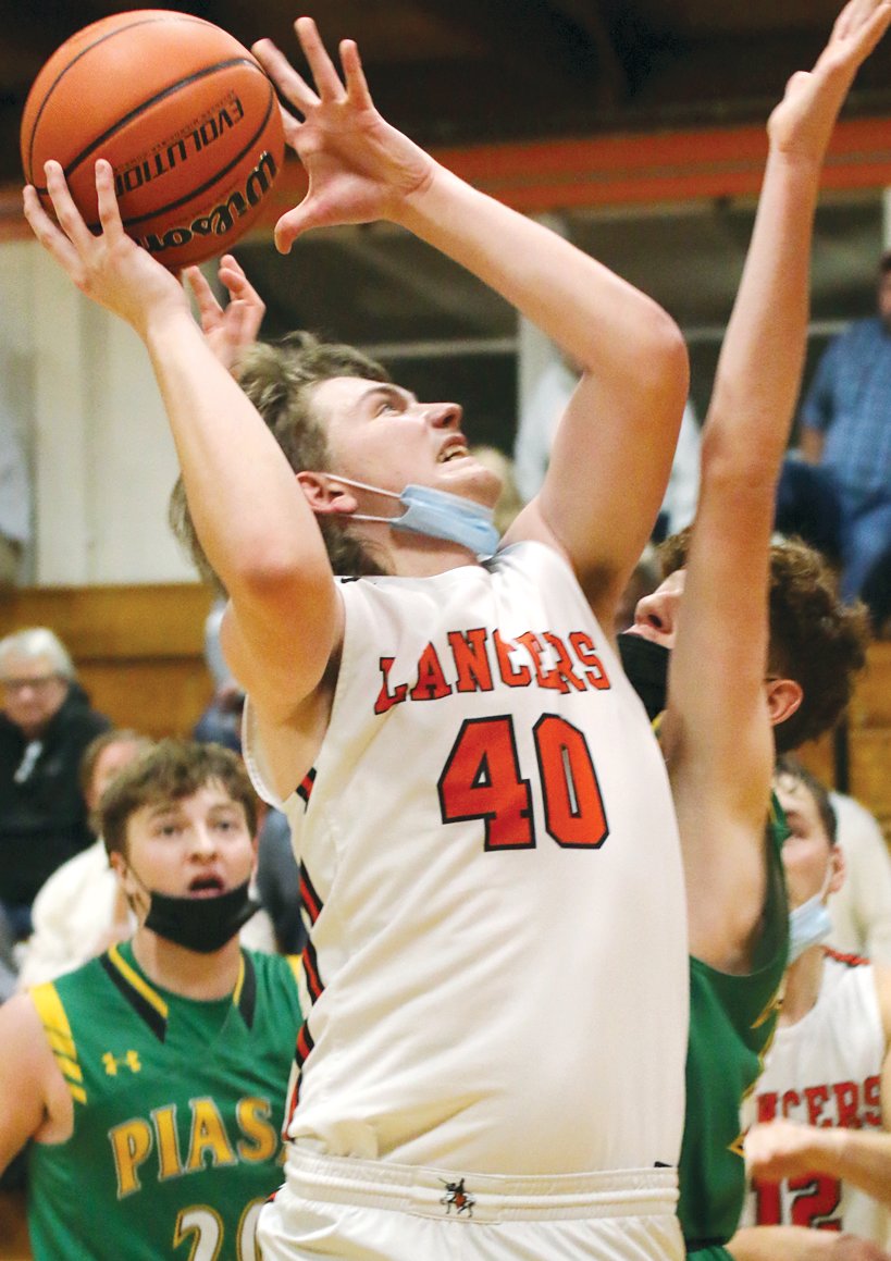Lincolnwood's Trenton Watson provided a spark for the Lancers in the second half as he scored six of his career-high eight points after halftime of Lincolnwood's 40-38 overtime victory over Southwestern on Saturday, Dec. 18.